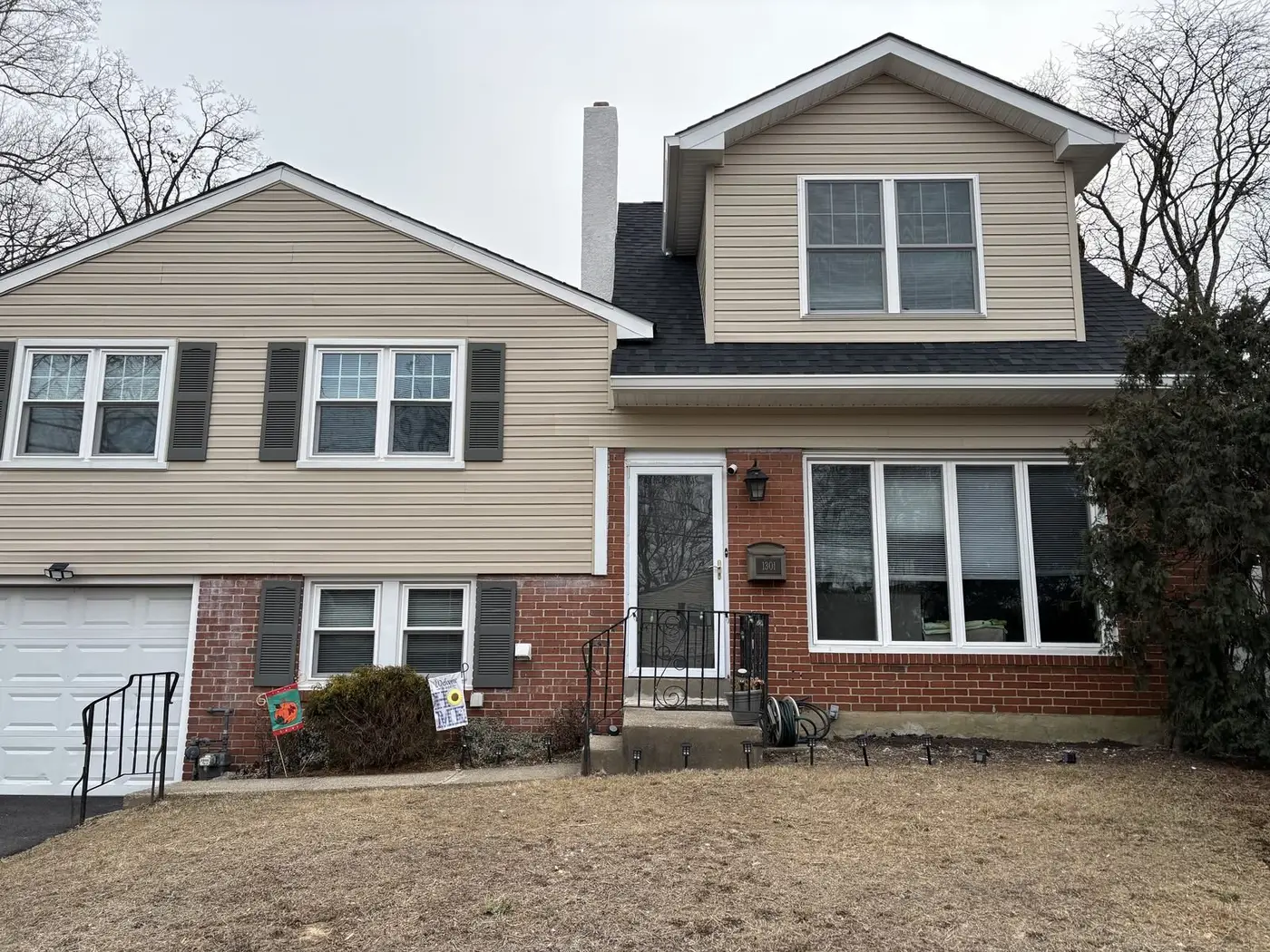 The same Abington house after Giuliani Builders added a third-story bedroom and bath with a front dormer