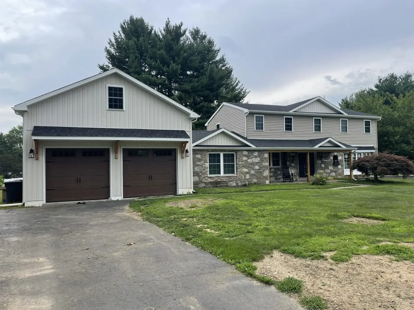 The same Huntingdon Valley house after the in-law suite addition and new two-car garage by Giuliani Builders